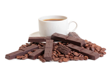 Coffee beans and cute chocolate on white background