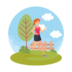 Obraz na płótnie Canvas athletic woman running in the park