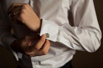 hands of groom and bride