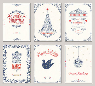 Ornate winter holidays greeting cards with New Year tree, gift box, Christmas ornaments, swirl frames and typographic design. 