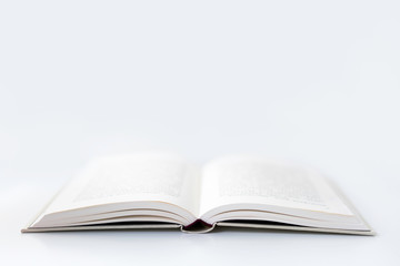 An Open Book in White Background