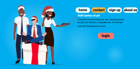 mix race business people wearing red hat sitting lotus pose gift box present using laptop female male cartoon character flat horizontal copy space vector illustration