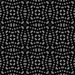 Seamless abstract pattern background with a variety of colored circles.