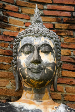 Old Buddha image in Sukhothai Historical Park, Thailand.