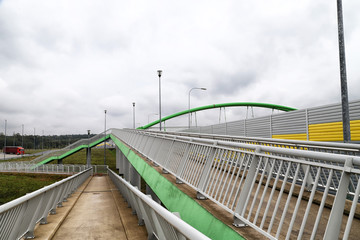 Fototapeta premium Elevated pedestrian crossing from the inside. Safe passage across the road