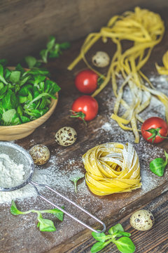 Raw homemade Italian typical pasta linguine noodles