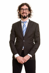 Happy handsome Caucasian businessman smiling and wearing suit