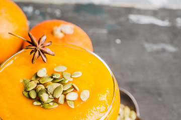 Refreshment and healthy autumn pumpkin drink. Selective focus. Shallow depth of field. 