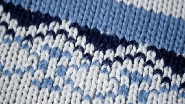 Warm knitted sweater with a pattern
