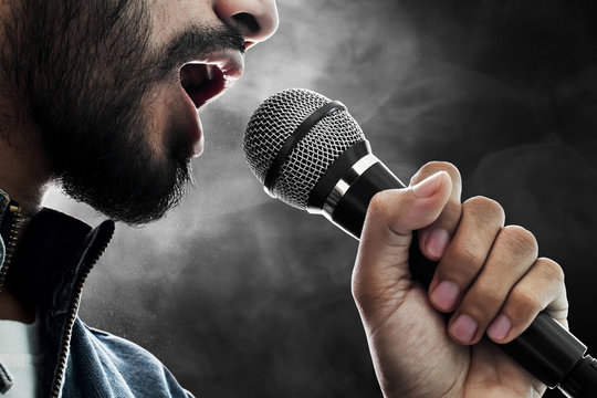 Close Up Singer Singing With Microphone