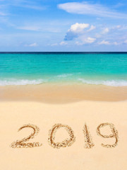 Fototapeta na wymiar Numbers 2019 on beach