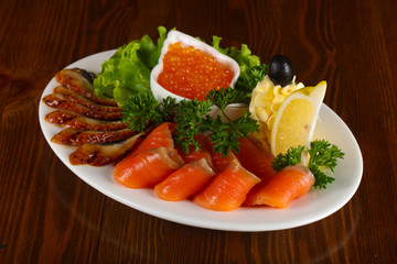 Trout fillet, red caviar and eel