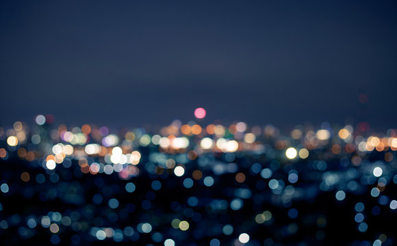 Blur colorful bokeh night city landscape © hakinmhan