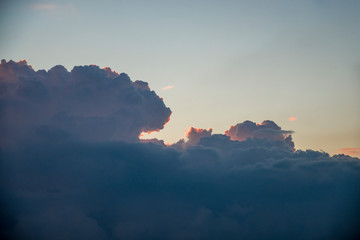 Clouds over ocean pouring rain