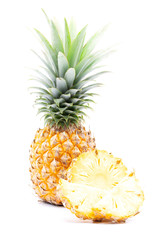 Slices from a whole pineapple on white background