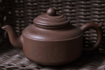 chinese teapot on wooden table