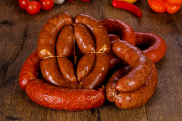 Pork sausages over wooden