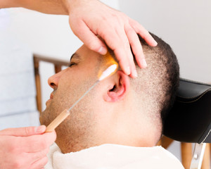 Turkish barber ear hair removal by burning fire