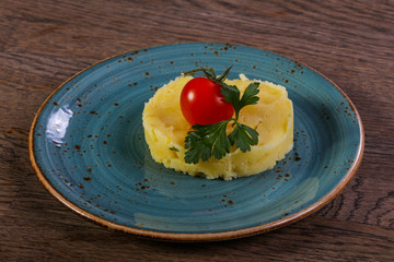 Mashed potato served tomato