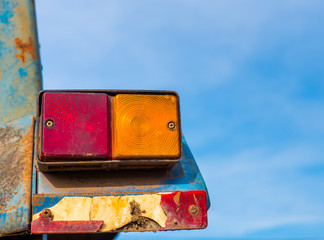 Old Tail lights on truck. Broken tail lights of the truck for show the turning and break movement of the driving on the road. Concepts of traffic signals car care. - Selective focus.