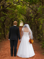 Newlyweds in the castle garden, Czech Republic.