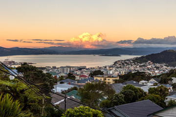 Fototapeta premium Sunset over Wellington city harbor, New Zealand