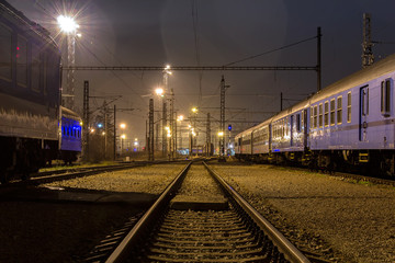 Train parked in station at night