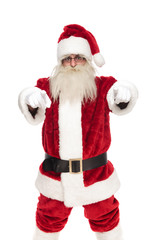 portrait of happy saint nick pointing fingers
