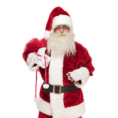 portrait of old saint nick ringing his bells