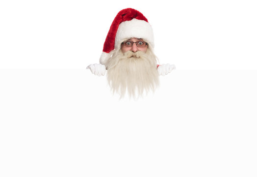 head of santa claus looking over white board