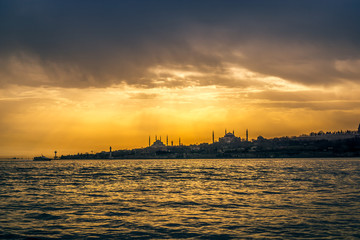 Istanbul cityscape at sunset from the water