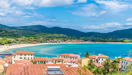Panoramic view over marina di campo town in Elba Island, Tuscany, Italy.
