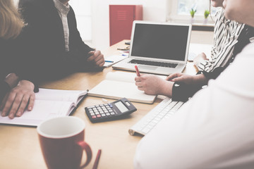 Fototapeta premium Young business on small home office desk