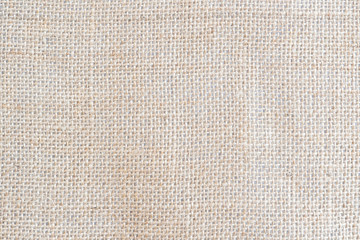 Fototapeta na wymiar Back brown Fabric canvas texture background with blank space for text design. Clean yellow beige Hessian sackcloth wool pleat woven concept cream sack pattern color, retro plain cotton cloth.