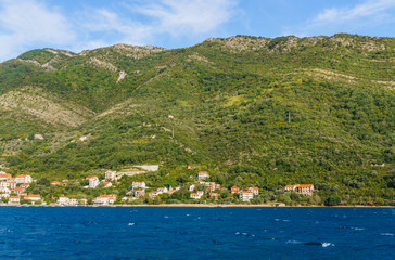 Fototapeta na wymiar Beautiful view of the water, the Montenegrin landscape. Summer panoramic view of the Kotor Bay. September2018