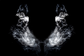 wings of smoke on an isolated black background