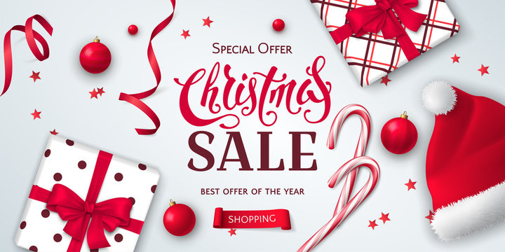 Vector horizontal banner for Christmas sale with gift boxes, Santa Claus hat, candy canes, ribbons, toys and confetti. Elegant festive background for design of flyers for discount and special offers.