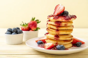 pancake with strawberries and blueberries