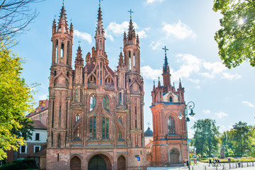 Fototapeta na wymiar Old cathedral from red bricks - church of St. Anne in Vilnius, Lithuania