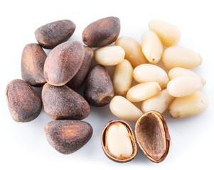 Pine nuts on the white background. Organic food.
