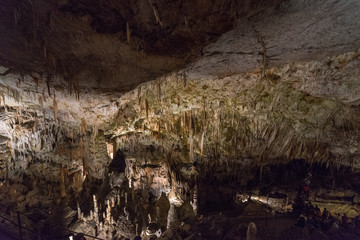 Interiors of Postojna Cave, Slovenia. Big caving area of Postojna. Underground halls, karst.