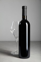 Luxurious vintage red wine in a black glass bottle.
