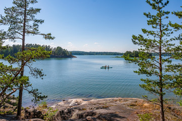 kayaking in the idyllic landscape on Angsoe Island, Stockholm archipelago, Sweden