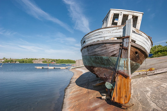 famous wreck of a fishing boat on the rocks of Koekar Island, Aland Islands between Sweden an Finland