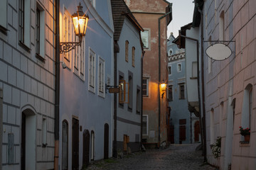Empty cobblestone street in the historic town of Cesky Krumlov during morning twilight. UNESCO World Heritage Site.