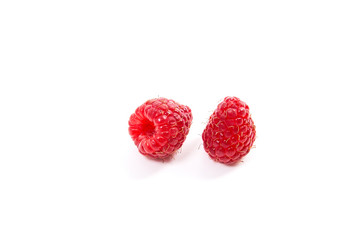 Ripe raspberries isolated on white background.