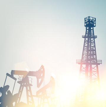 Oil pumps and derricks over sunset background. Vector illustration.