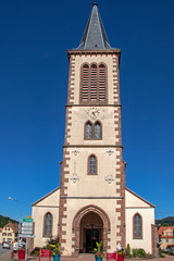 Fototapeta na wymiar Titre : Munster. Eglise catholique Saint Léger . Alsace. Haut-Rhin. Grand Est
