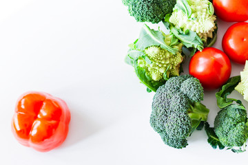 Vegetable variety on wooden white table. Selection of summer and autumn vegetables, space for text