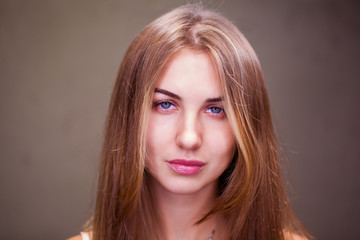 Naklejka premium Young blonde woman without makeup